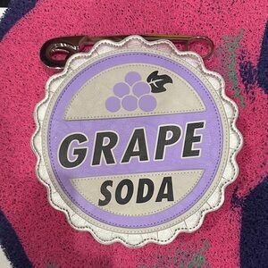 Rare Pixar Disney Parks Exclusive Up Grape Soda Clutch